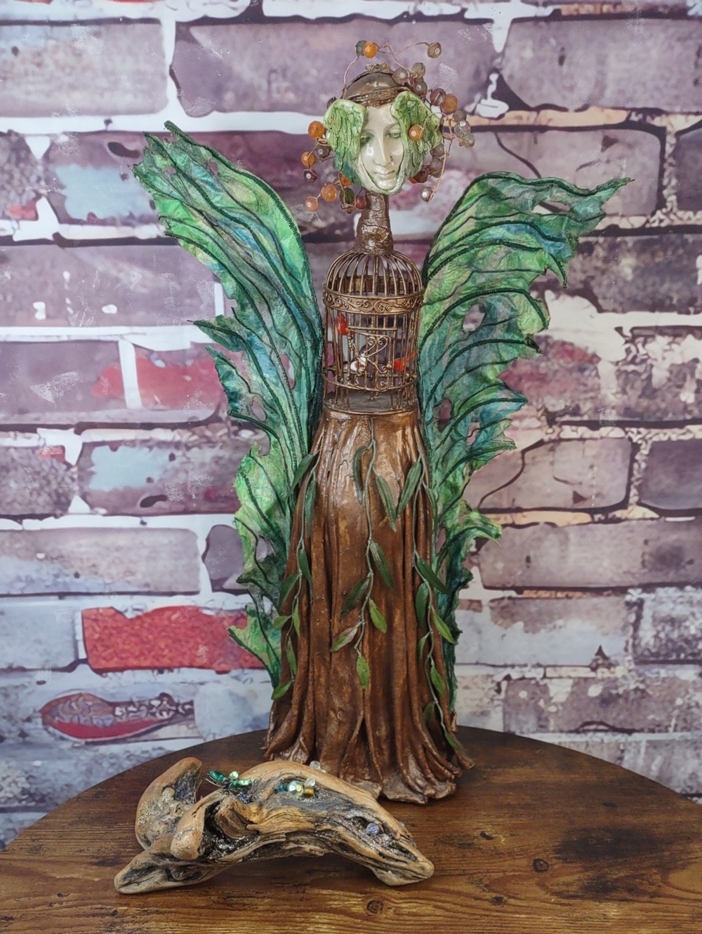 Artisan Crafted Winged Fairy Sculpture with Cage Accent
